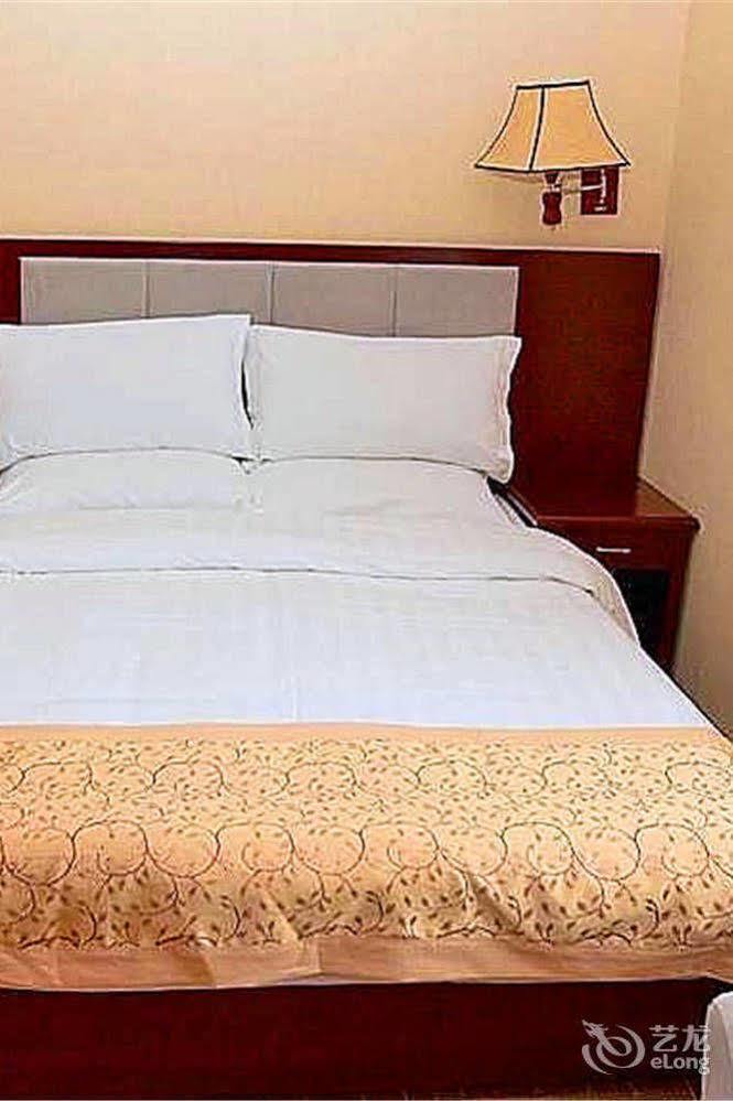 Triumph Power Hotel Shiyan  Buitenkant foto